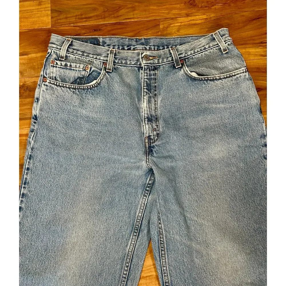 Vintage 90s Levi’s 550 Relaxed Fit Tapered Leg Jeans 38x34 Light Wash Distressed